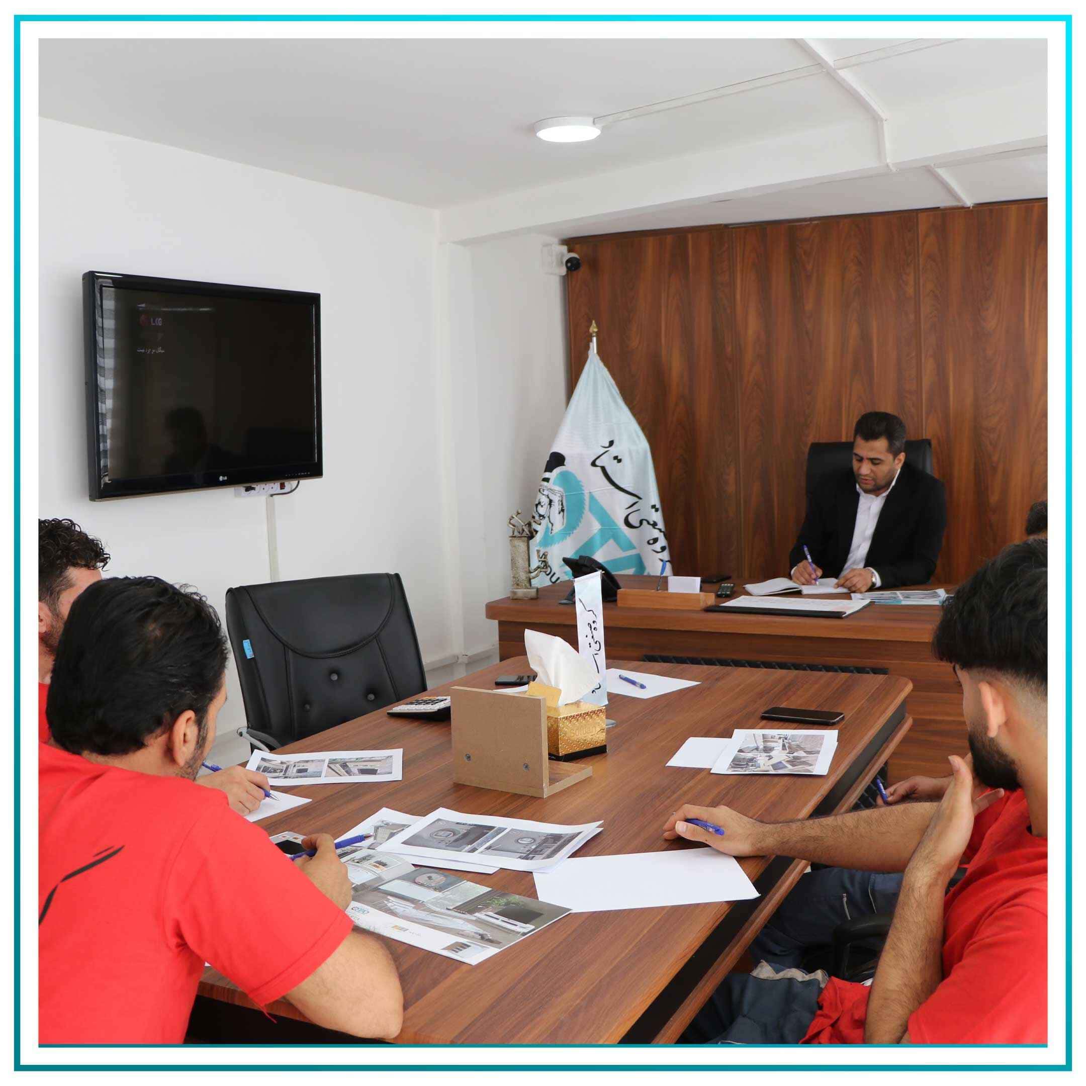 Professors meeting with staff